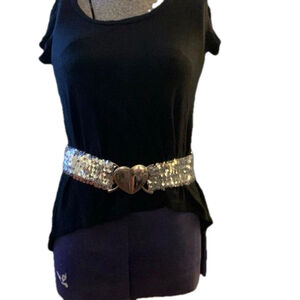 Stretchy sequin belt with large silver heart buckle